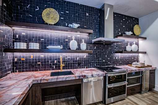 Modern Clubhouse Kitchen with Stainless Steel Appliances at apartments for rent 89084