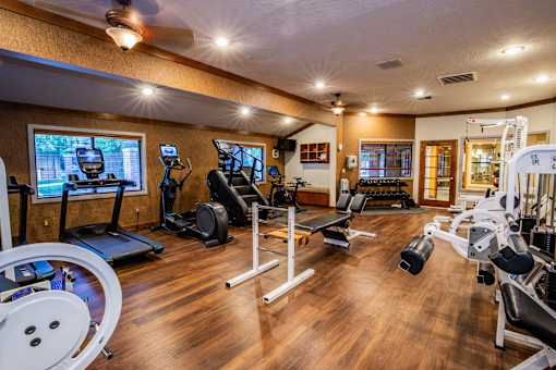 Full Gym with Free Weights at SLC Apartments for Rent