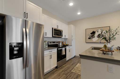 Brand New Apartment Kitchen with Stainless Steel Appliances