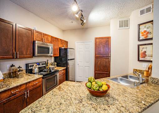 Apartments near Galleria Dallas with Full Kitchen and Wood Cabinets