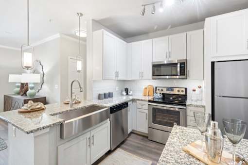 Upgraded Modern Kitchen with Granite Countertops in Glendale Apartment
