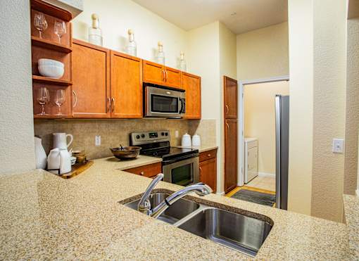Full Kitchen with Stainless Steel Appliances at Apartments in Paradise Valley