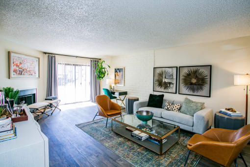 the living room of an apartment with a couch and a coffee table