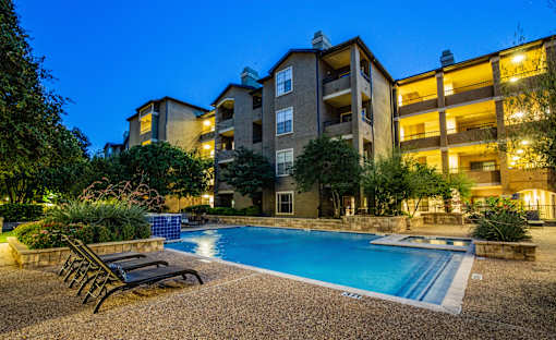 Lighted Swimming Pool at Night at Dallas Apartments Near Me