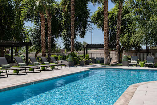 Refreshing Swimming Pool with Lounge at Apartments near SR 101