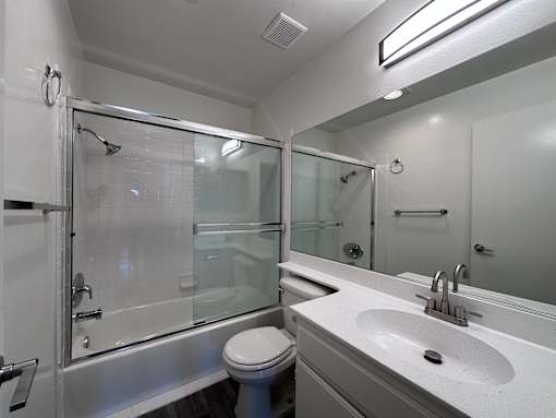 White Bathroom at Lido Apartments - 3745 Glendon Ave, Los Angeles, 90034