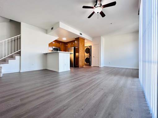 Bright empty room with natural sunlight at Lido Apartments - 10133 Tabor St, Los Angeles, CA