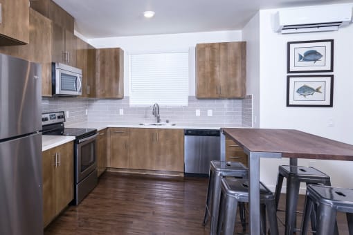 One Bedroom Kitchen - Tile Backsplash Available in Select Apartments  at Park Square at Seven Oaks, Bakersfield