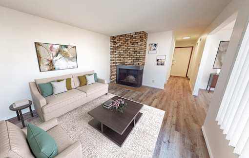 a living room with a couch and a coffee table