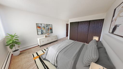 our apartments offer a bedroom with a bed and a closet