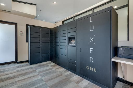 Metalic lockers with the words "Luxer One" written on them