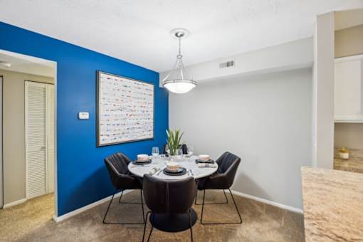 A dining room with a table set for six at Chinoe Creek Apartments, Kentucky, 40502