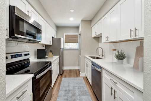 Kitchen at The Courtyards of Chanticleer Apartments, Virginia, 23451