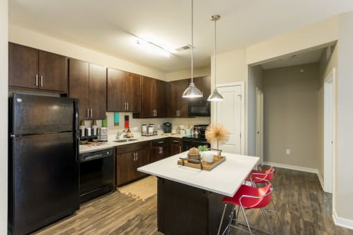 Open Kitchen With Island Dining at AMP Apartments, PRG Real Estate, Kentucky