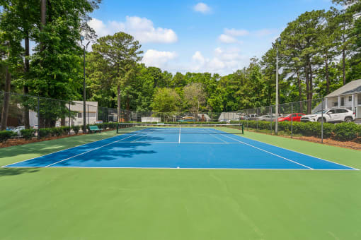 the tennis court at the estates apartments at Lake Johnson Mews, North Carolina, 27606