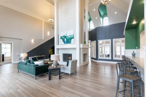 Resident lounge with fireplace at The Resort at The Resort At Lake Crossing Apartments, PRG Real Estate, Kentucky