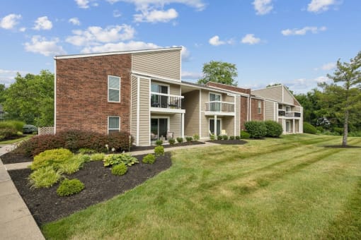 our apartments at the district feature a spacious yard and green grass at The Grove at Lyndon, Louisville