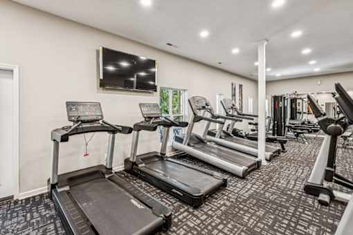 A gym with treadmills and other exercise equipment. at Park Ridge Estates, North Carolina