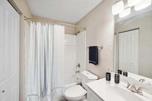 Bathroom with Shower at Lakecrest Apartments, PRG Real Estate Management, Greenville, SC