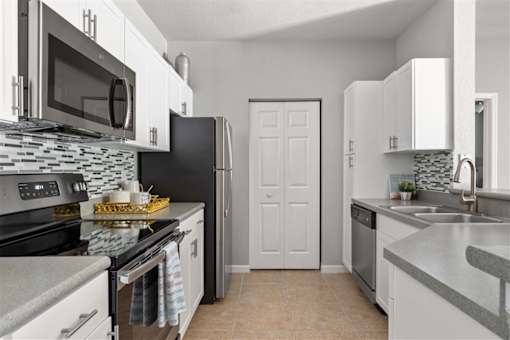 Kitchen in Citrus Tower Apartments in Clermont, FL