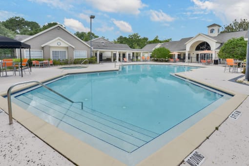 Sparkling Swimming Pool with Sun deck at Palm Crossing Apartments in Winter Garden, FL