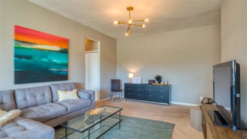 Living room interior with colorful art at The Lafayette, Norfolk, 23508