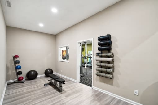 the avenues salt lake custom homes interior fitness room  at Park Ridge Estates, Durham, NC, 27713