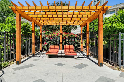 Pool side wooden pergola at Palmetto Place Apartments