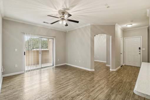 Open Living Room and Sectioned Dining Area at Mission Hills Apartments, Texas, 78258