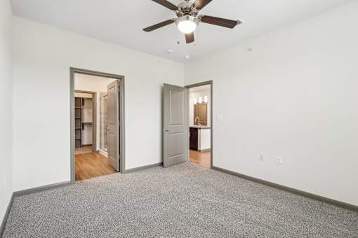 Spacious Bedroom and Connected Bathroom at Park at Rialto Apartments, San Antonio