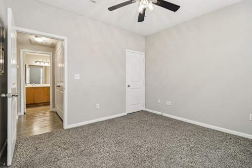 Spacious Bedroom with Ceiling Fan at Mission Hills Apartments, Texas, 78258