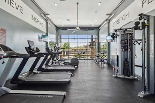 Large Fitness Center with Treadmills, Free Weights & Much More  at Overlook at Stone Oak Park Apartments, San Antonio