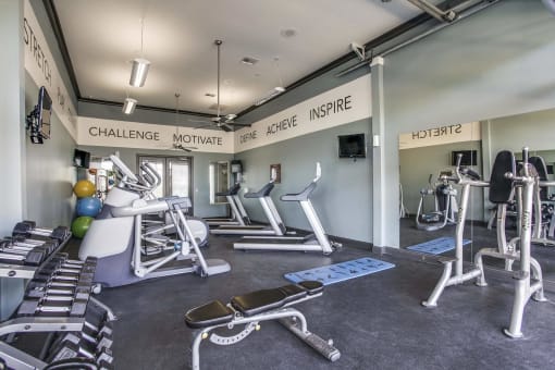 Large Fitness Center with Treadmills, Free Weights & Much More  at Overlook at Stone Oak Park Apartments, San Antonio