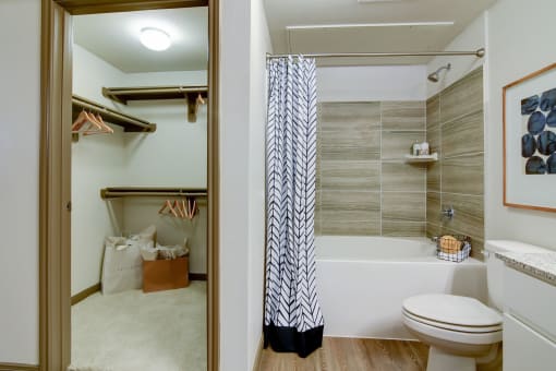 Upgraded Bathroom with Tile Surround Tub & Large Closet