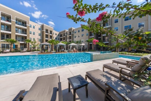 Sparkling Pool Area with Cabanas and BBQ Area at District at Medical Center, San Antonio, TX, 78229