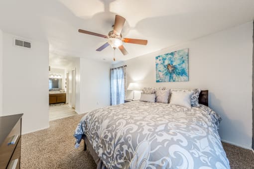 Bedroom with Connecting Bathroom at Oaks of Westlakes Apartments, San Antonio, Texas