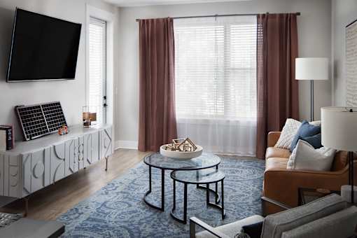 a living room with a couch and a table