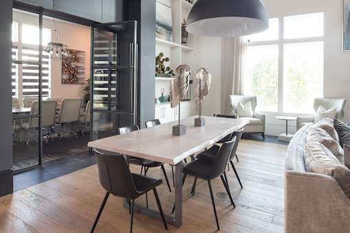 Open concept dining and living area with office at Avli At Crosstown Center Apartments, TAMPA