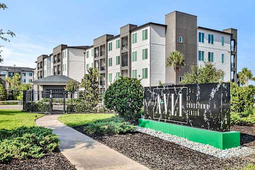 Property entrance sign at Avli At Crosstown Center Apartments, TAMPA, FL 33619