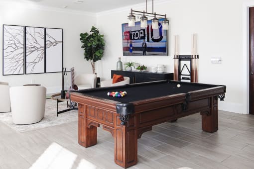 a billiards table in a living room