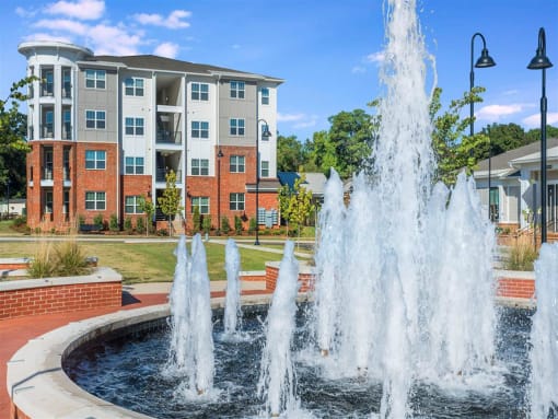 Lush Pointe at Prosperity Village Courtyards With Trickling Fountains in North Carolina Apartments for Rent