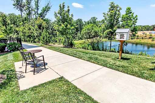 a patio with a table and chairs