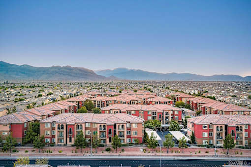 an aerial view of a city with a lot of houses