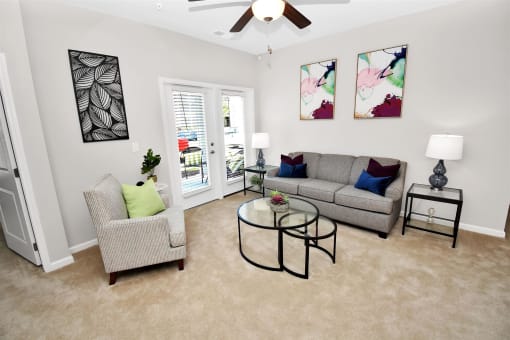 a living room with two couches and a coffee table