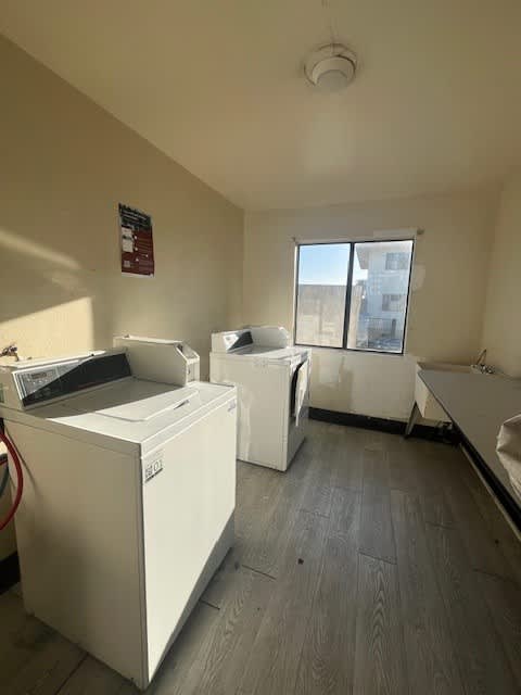 A laundry room with a washer and dryer.