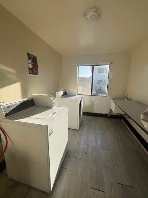 A laundry room with a washer and dryer.