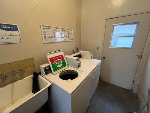 A laundry room with a washer and dryer.