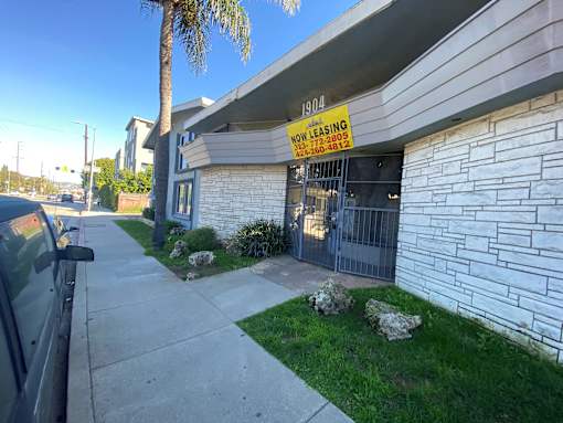 A non-leasing sign is displayed on a building.