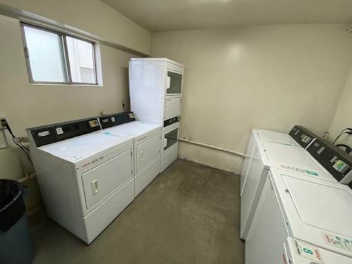 A laundry room with a washer and dryer.