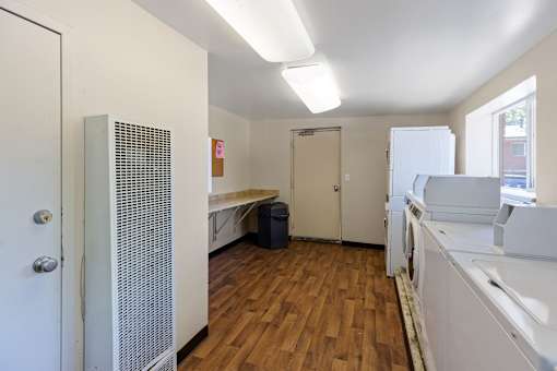 A laundry room with a washer and dryer.